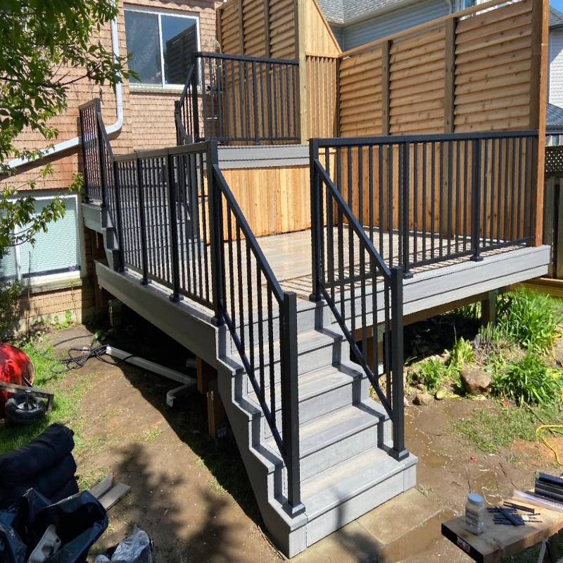 Composite deck with railing and privacy screen